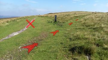 A photo of step 2 of the Axe Edge Walk route, with red arrows superimposed to show the way.