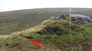 A photo of step 5 of the Axe Edge Walk route, with red arrows superimposed to show the way.