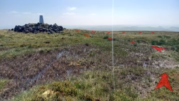 A photo of step 6 of the Axe Edge Walk route, with red arrows superimposed to show the way.