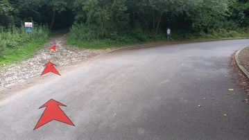A photo of step 1 of the Bamford Edge Walk route, with red arrows superimposed to show the way.