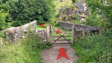 A photo of step 4 of the Chee Dale Walk route, with red arrows superimposed to show the way.