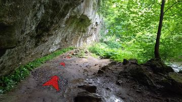A photo of step 17 of the Chee Dale Walk route, with red arrows superimposed to show the way.