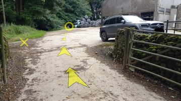 A photo of step 35 of the Chee Dale Walk route, with yellow arrows superimposed to show the way.