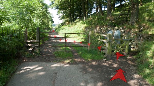 A photo of step 5 of the Fernilee Reservoir route, with red arrows superimposed to show the way.