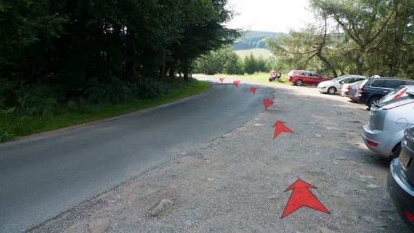 A photo of step 1 of the Fernilee Reservoir route, with red arrows superimposed to show the way.