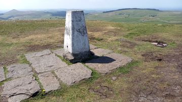 A photo of step 10 of the Shining Tor Walk route, with red arrows superimposed to show the way.