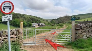 A photo of step 3 of the Three Shires Head Walk route, with red arrows superimposed to show the way.